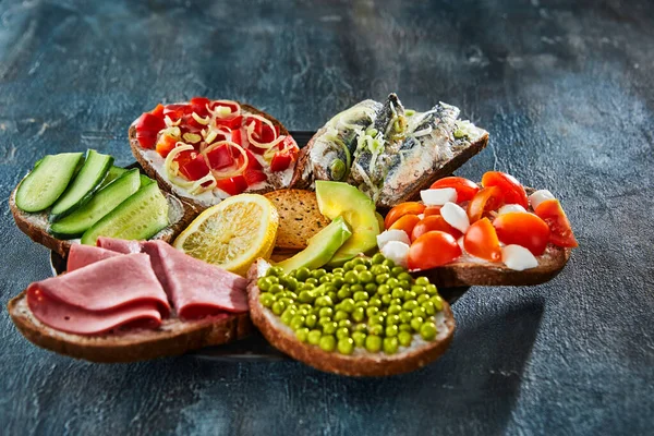 Assorted Open Faced Sandwiches Sandwiches Slices Sourdough Various Fillings Plate — Stock Photo, Image