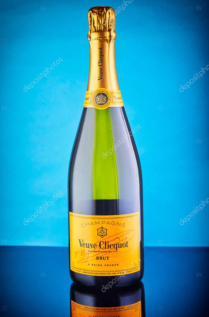 Tel Aviv, Israel - 24 april 2020: French champagne Veuve Clicquot on a blue background with reflection.