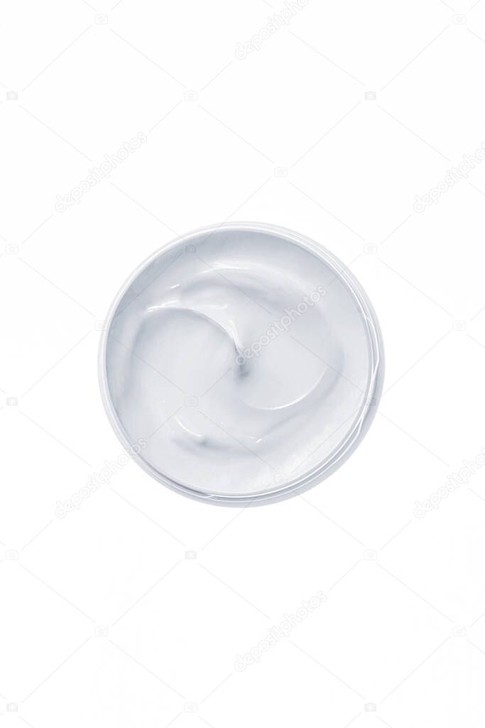 Empty white plastic tube compression bottle on white background. Packaging of cream, lotion, gel, facial foam or skin care. Cosmetic beauty product breadboard branding. Copy space.
