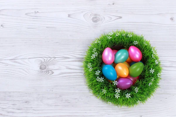 Easter eggs on grey wooden ground — Stock Photo, Image