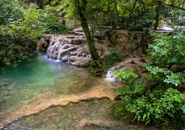 Waterfall in the mountain Stock Photo