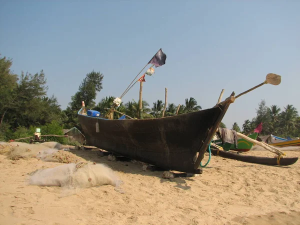 fishing boats lined along the shore. India, Karnataka
