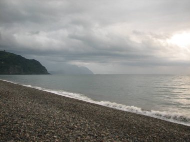 Günbatımı plaj sandalyesi ile denize
