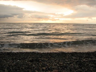 Günbatımı plaj sandalyesi ile denize