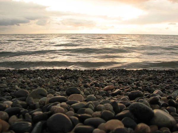 Günbatımı plaj sandalyesi ile denize
