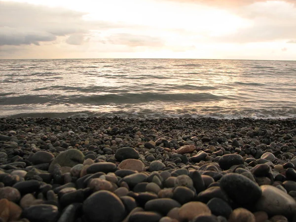 Günbatımı plaj sandalyesi ile denize