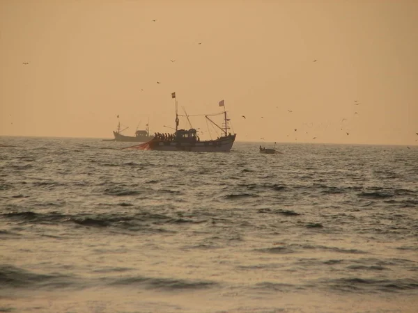 fishing boats lined along the shore. Cherating, Malaysia.