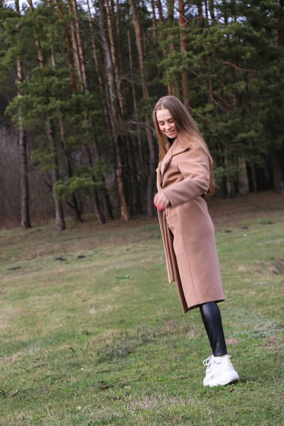 Beautiful Girl Blonde Long Hair Walks Spring Forest Brown Coat — Stock Photo, Image