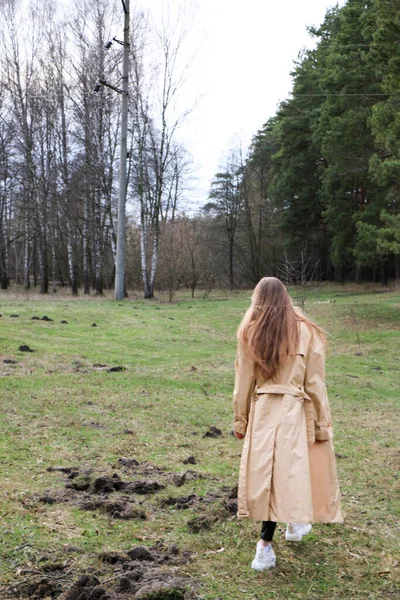 Beautiful Girl Blonde Long Hair Walks Spring Forest Brown Coat — Stock Photo, Image
