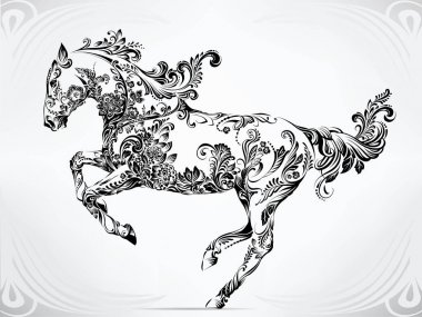 At içinde çiçek süsleme çalıştıran