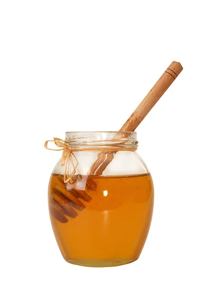 Delicious sweet honey in glass jar isolated on white background. — Stock Photo, Image