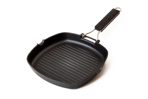 New frying grill empty pan isolated on white background. — Stock Photo, Image