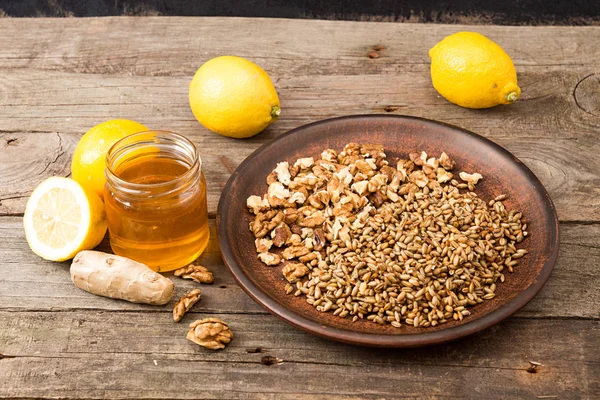Healthy food:  mix of lemon, germinated wheat, walnuts, honey, g — Stock Photo, Image