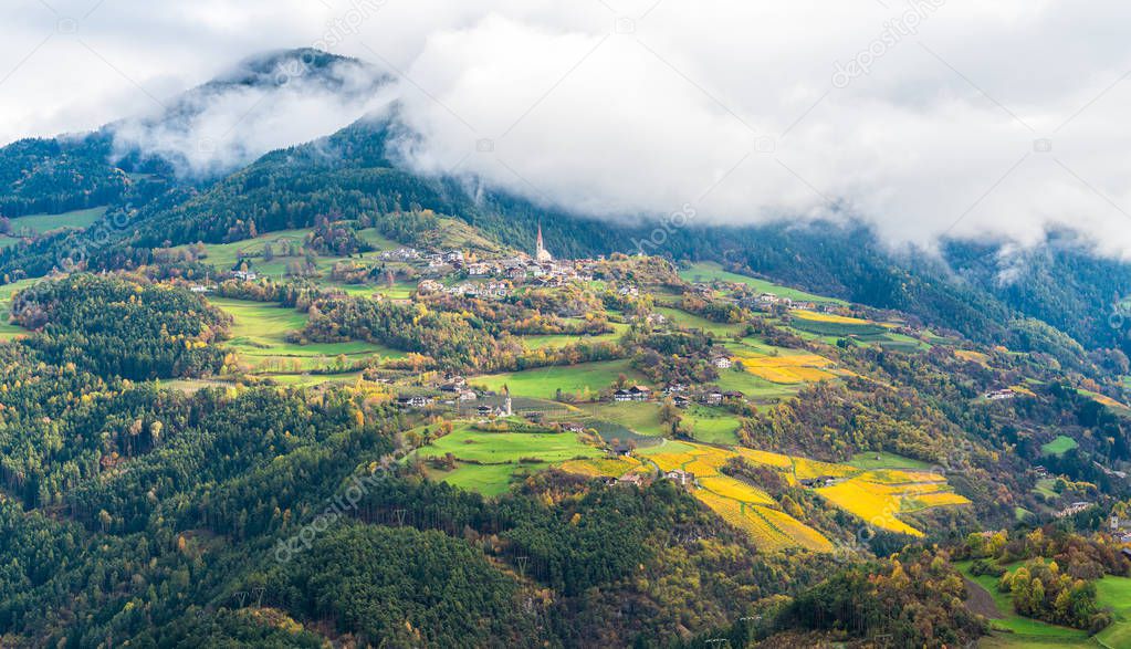 Panoramic autumn view with Tiso village, Province of Bolzano, Trentino Alto Adige, Italy.