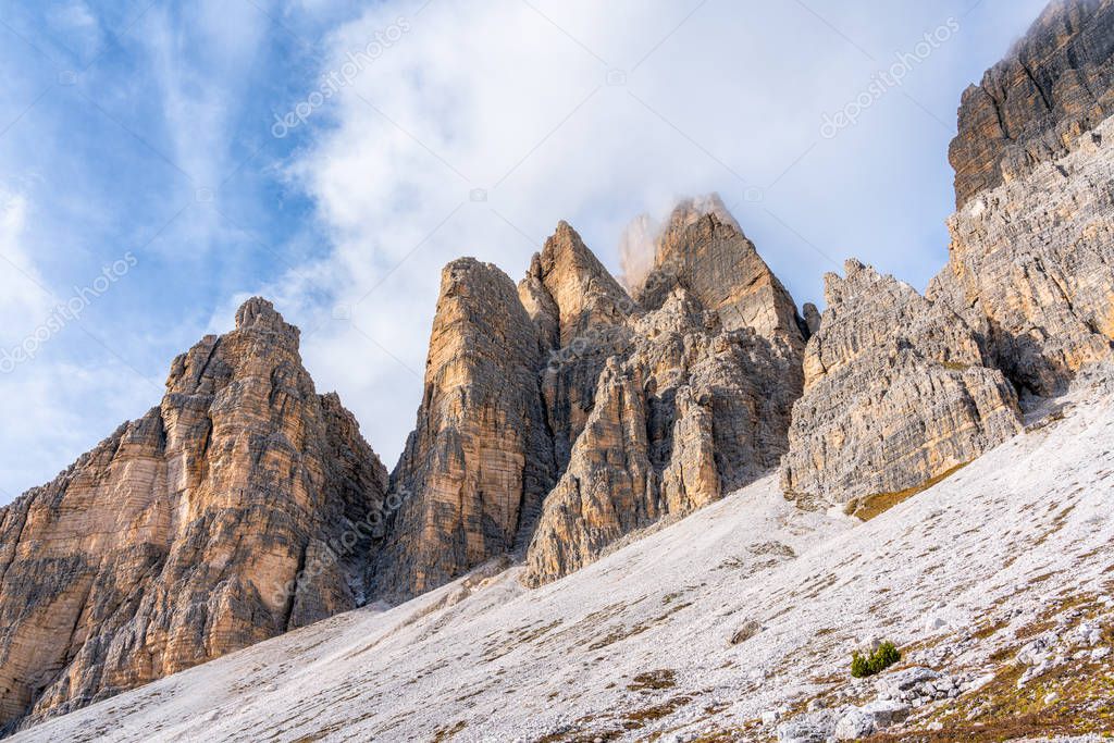 Scenic sight of the famous peaks Tre Cime di Lavaredo. Veneto, Italy.