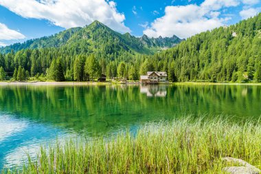 Idyllic landscape at Lake Nambino, near Madonna di Campiglio. Province of Trento, Trentino Alto Adige, northern Italy. clipart