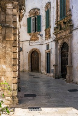 Scenic sight in Martina Franca on a sunny summer morning, province of Taranto, Apulia, southern Italy.