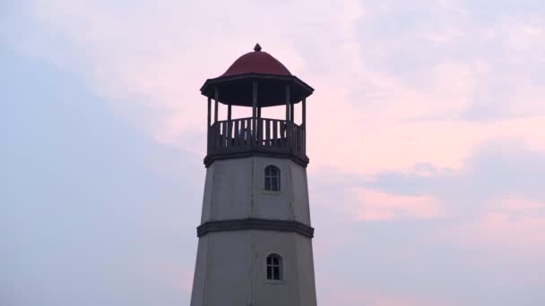 Small White Lighthouse Red Roof Village Houses Evening Sunset Pink — Stock Video