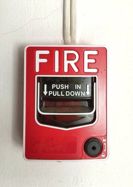 Fire alarm on cement wall