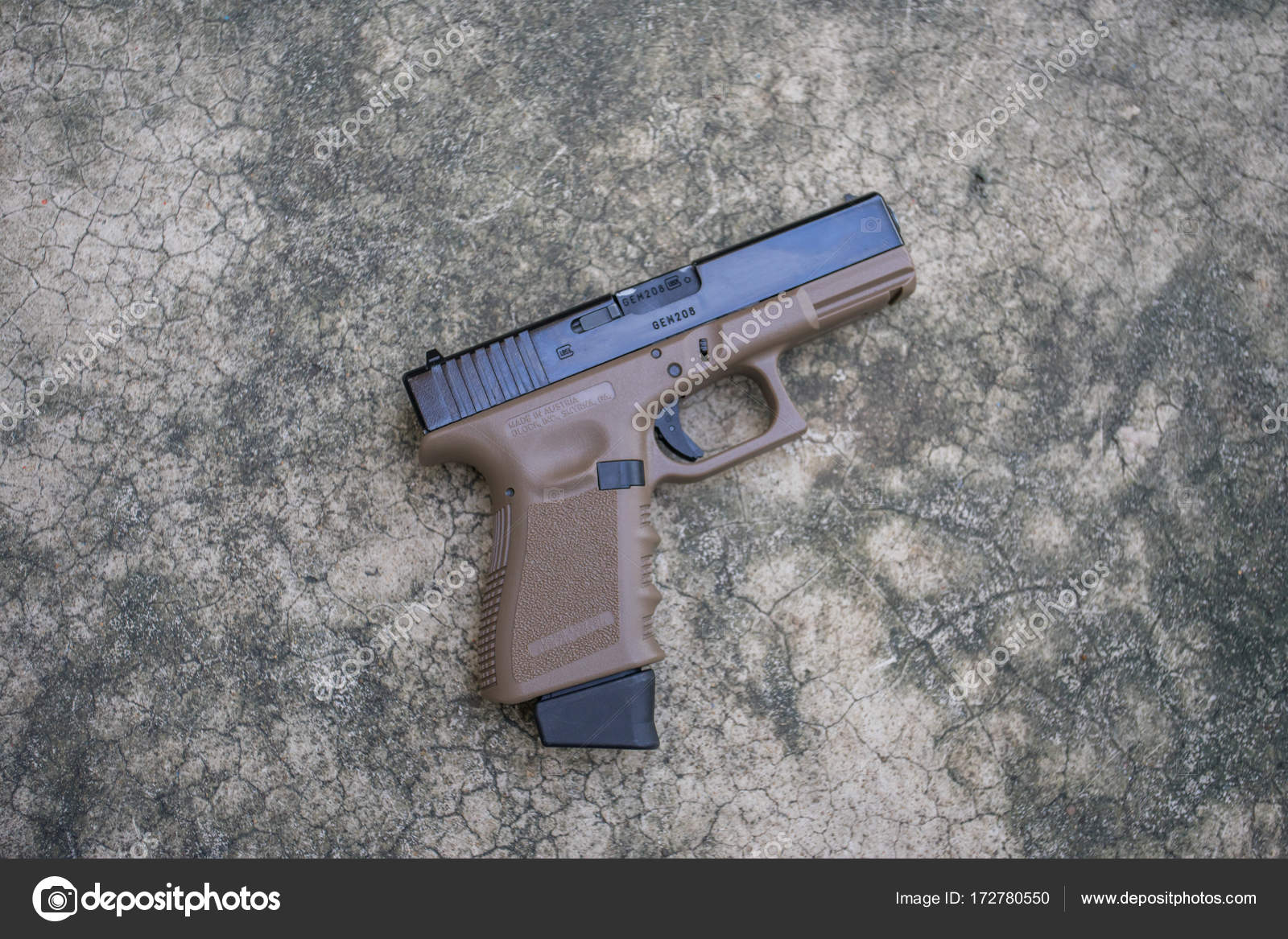 Glock 19 twotone airsoft 6 mm bullet ball pistol gun on the floor