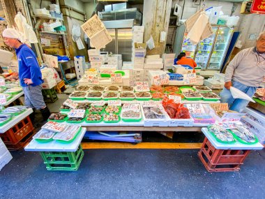 Tokyo Japan - 04 Nov 2019: Lot of raw seafood sailing in the Ameyoko market area, This place is travel attraction for tourist in Tokyo Japan