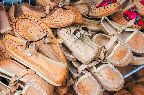 Pile of cute children leather shoes — Stock Photo, Image