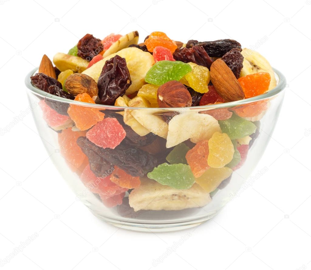 Dried fruits in glass bowl isolated