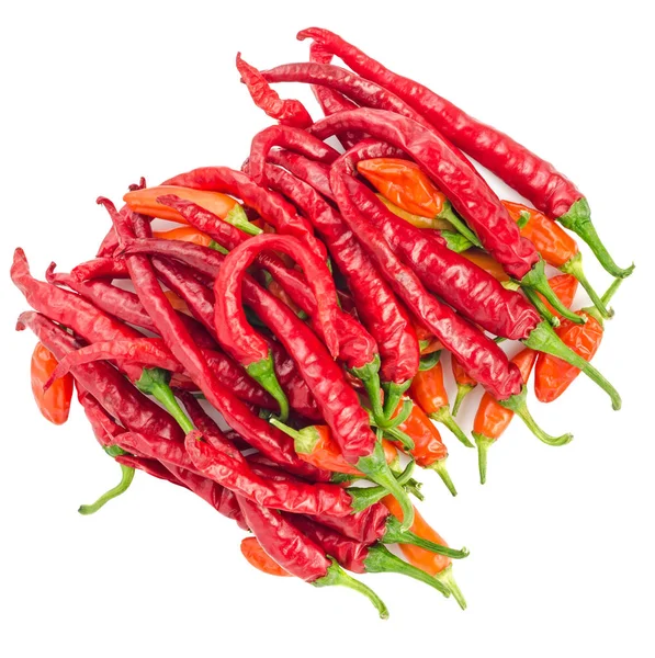 Vista superior de chiles rojos picantes aislados en un blanco — Foto de Stock