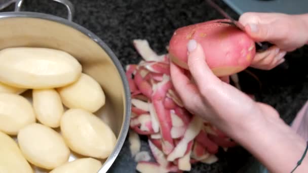 Closeup Woman Hands Peeling Potato — Stock Video
