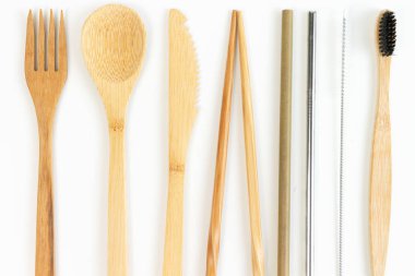 Pattern from eco friendly bamboo cutlery on a white background. Zero waste concept. Flat lay