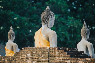 Lotus flowers, candles and incense sticks offered by Thai people at Asahna Bucha Day.