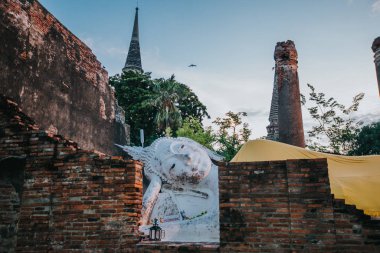 Lotus flowers, candles and incense sticks offered by Thai people at Asahna Bucha Day.