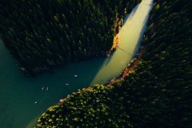 Lake with small boats seen from a drone 