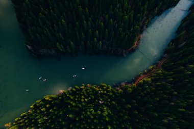 Lake with small boats seen from a drone 