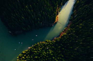 Lake with small boats seen from a drone 