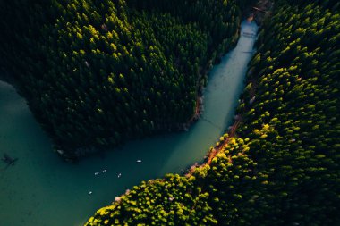 Lake with small boats seen from a drone 