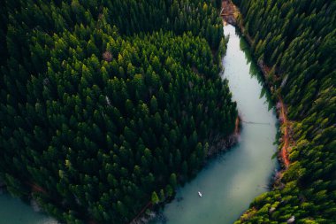 Lake with small boats seen from a drone 