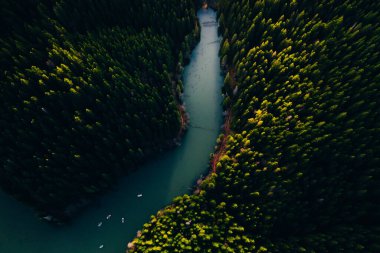 Lake with small boats seen from a drone 