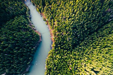 Lake with small boats seen from a drone 