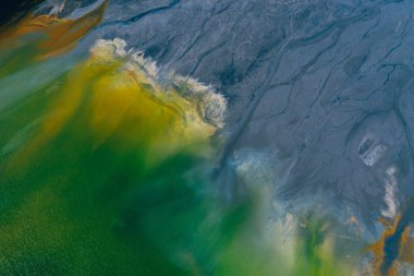Drone view of contaminated, toxic water stream in Geamana, Roman