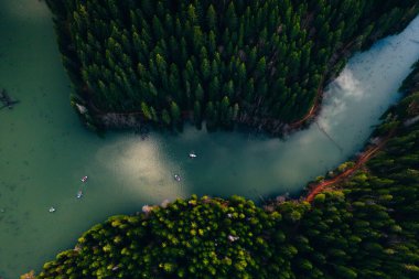 Lake with small boats seen from a drone 