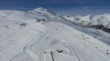 Drone view of mountain ski slopes.