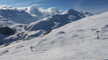 Drone view of mountain ski slopes.