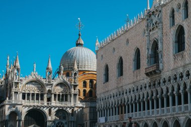 VENICE, ITALY -APRIL 8: Gondolas and tourists on April 8, 2019 in Venice, Italy. Venice has an average of 50,000 tourists a day.