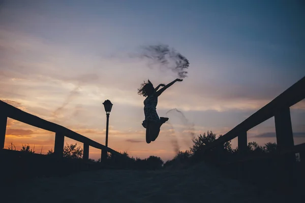 Silhouette Happy Woman Jumping Sand Sunset — Stock Photo, Image