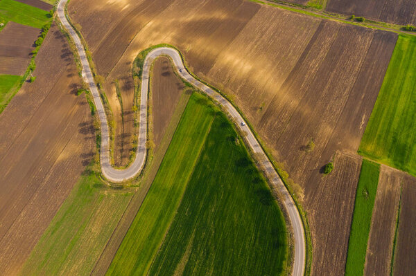 Drone view of  empty agricultural fields in spring.