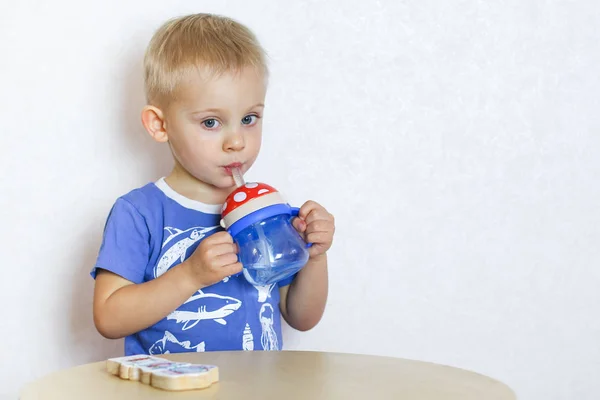 Toddler Boy Drinking His Drinker Straw Sitting Play Table 로열티 프리 스톡 이미지