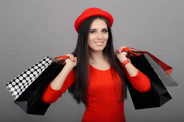 Mulher na moda feliz com sacos de compras — Fotografia de Stock