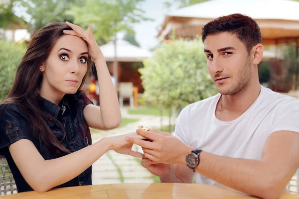 Surprised Woman Receiving Engagement Ring from Man — Stock Photo, Image