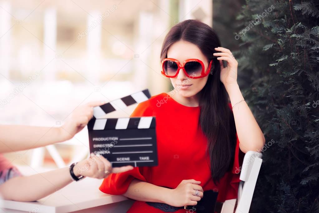 Actress with Oversized Sunglasses Shooting Movie Scene